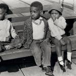 Three little kids on a park bench in Sausalito, California, 1962
